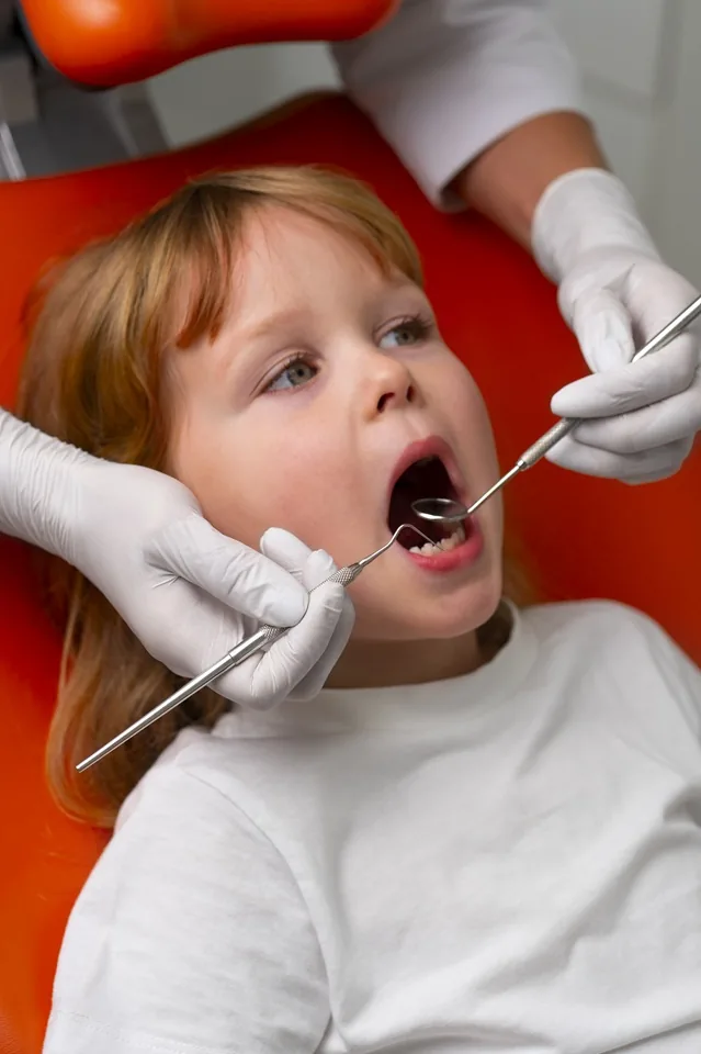 Pediatric dentistry gentle child exam with precision instruments — MAP Dental Center Houston pediatric service.