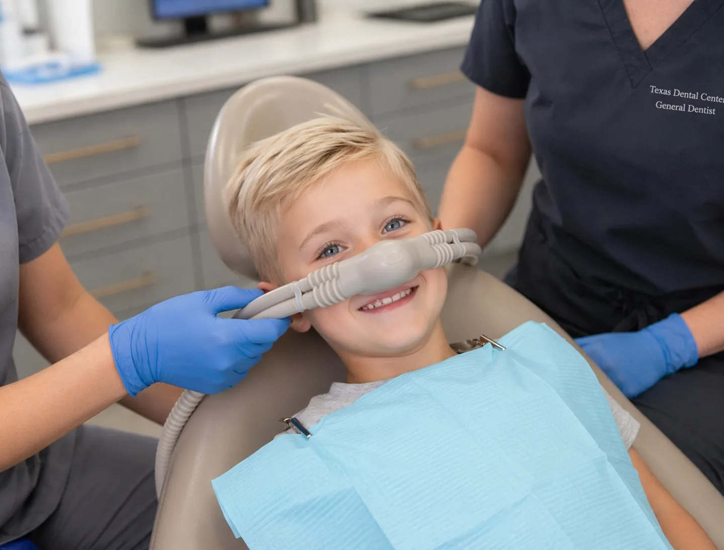 Smiling young patient receiving safe nitrous oxide sedation at MAP Dental Center.